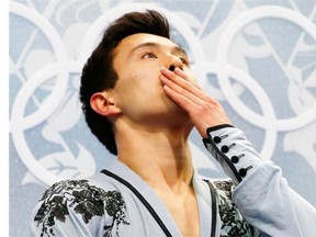 Canada’s Patrick Chan reacts in the kiss and cry zone the Men’s Figure Skating Free Program at the Iceberg Skating Palace during the Sochi Winter Olympics on February 14, 2014.