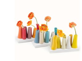 Chive’s Pooley 2 fully glazed ceramic bud vases come in eight- or 12-vase configurations and attach to a rectangular base.
 Chive