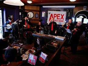 (R-L) Clarinetist Roger Cramphorn, Trumpeter Gordon Tapp and Trombonist Rod Digney are three members of the Apex Jazz Band, who played at the Royal Oak in Kanata on April 13, 2014. David Kawai/Ottawa Citizen   #116720   (For story by Peter Hum)