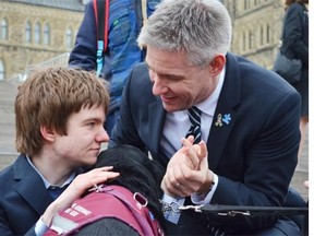 Conservative MP Mike Lake attended the World Autism Awareness Day rally Wednesday on Parliament Hill with son Jaden, 18.