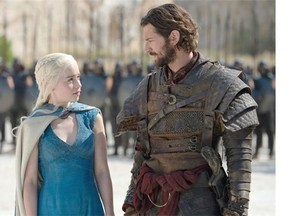 Daenerys Targaryen (Emilia Clarke), left, talks with a mercenary in Game of Thrones. Helen Sloan/HBO