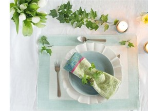 Designers at Fleuriste Gilchrist suggest starting a table setting with a base of neutral colours.