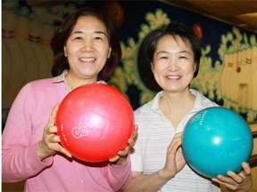 The diplomatic hospitality group hosted a bowling event March 28 at McArthur Lanes. From left, Huey Pyng Liu and Sherry Su, of Taiwan.