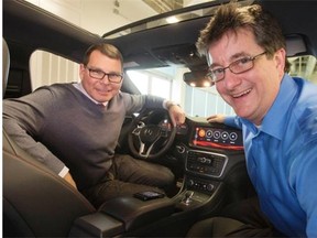 QNX, a division of BlackBerry, helps merge tech options with the auto industry. Here Derek Kuhn, vice-president of sales, and Grant Courville, director of product management, show off a Mercedes CLA45 AMG at the company’s headquarters.