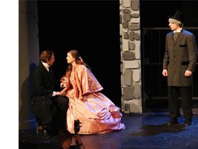 Keagan Eskritt, performs as Marius (L), and Michael Collins, performs as Thénardiers (R), during Nepean High School’s Cappies production of Les Misérables, on Apr. 9, 2014, in Ottawa.