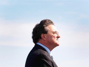 Federal Finance Minister Jim Flaherty speaks to reporters at the Port of Montreal, September 27, 2010. Flaherty died Thursday April 10, 2014. He was 64.