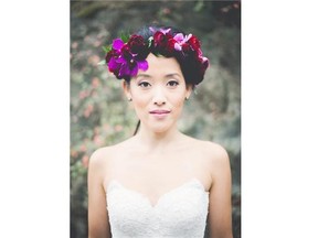 A floral crown created by The Flower Factory worn by bride Holly Chan.