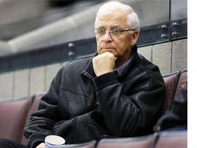 General manager Bryan Murray is deep in thought as the Ottawa Senators practice at the Canadian Tire Centre in Ottawa, March 19, 2014.