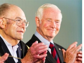 Herb Gray (L) applauds as Governor General David Johnston (R) prepared to deliver the keynote address at the Carleton University New Student Convocation.