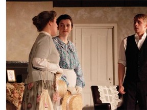 Jocelyn Hogeterp performed as Mrs. Higgins (L), Alex Bateman as Eliza Doolittle (2ndL), and Daniel Schenk as Professor Henry Higgins (R) during Redeemer Christian High School’s Cappies production of Pygmalion, on April 26, 2014, in Ottawa, Ont.