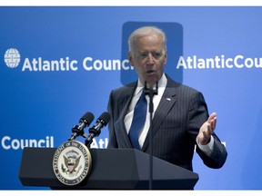 Vice President Joe Biden is seen behind a teleprompter as speaks at the Atlantic Council's conference, in a special tribute to NATO and the European Union, Wednesday, April 30, 2014, in Washington. Biden drew parallels between Russia's interference in Ukraine and the world wars of the last century. Biden said Ukraine's struggles start with Russia's acute violation of rules that the 20th century taught us must be upheld. He says Russia has violated the fundamental principle that Europe's borders cannot be changed by military force.