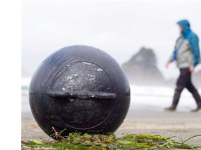 Trash believed to be from Japan sits on Long Beach in Tofino, B.C.. The worst predictions of debris-littered beaches along the west coast of North America from the tsunami have not come true.