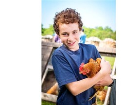 Keeping backyard chickens is a great way for young people to exercise responsibility and contribute toward the household. Steve Maxwell’s son Jake takes care of the family’s chickens.