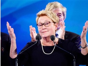 PQ leader Pauline Marois takes the stage after her party was defeated in the provincial election Monday April 7, 2014 in Montreal. Marois lost her seat in Charlevoix-Cote-de-Beaupre to Liberal candidate Caroline Simard. THE CANADIAN PRESS/Paul Chiasson