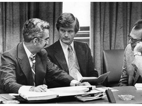 Liberal MPs Jean-Luc Pepin, left to right, Art Phillips and Herb Gray discuss strategy in preparation for the opening of Parliament in Ottawa in this 1979 file photo. Former Vancouver mayor Art Phillips passed away on Friday at the age of 82. Phillips served as the city's mayor in the 1970s and was responsible for municipal decisions that paved the way for downtown densification, including the fight against a waterfront freeway. THE CANADIAN PRESS/Peter Bregg