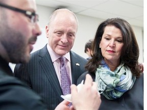 Librarian Mark Gelsomino shows U.S. Ambassador Bruce Heyman and his wife, Vicki, a 3D ‘print’ of Batman on Wednesday in the Imagine Space: An American Corner at the Ottawa Public Library Centrepointe Branch.