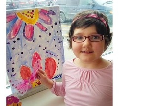 Maisy Anderson, 8, who has leukemia, loves to use lots of colour when painting during watercolour workshops run by Candlelighters. The artworks by 20 children who have cancer, and by their siblings, will be part of a fundraising auction called Spring Blooms on April 30.