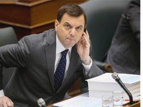 Ontario PC Leader Tim Hudak attends question period at Queen's Park in Toronto on Tuesday, April 1, 2014. THE CANADIAN PRESS/Chris Young