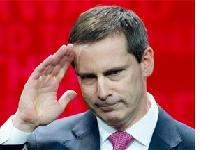 Ontario Premier Dalton McGuinty salutes at the end of his final speech as Premier at the Ontario Liberal Party Leadership convention in Toronto on Friday January 25, 2013. THE CANADIAN PRESS/Frank Gunn