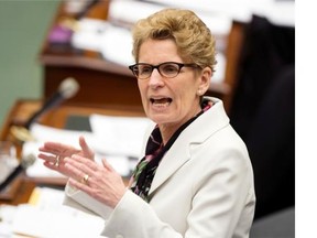 Ontario Premier Kathleen Wynne responds during question period in the Ontario Legislature n Toronto on Tuesday April 8, 2014.