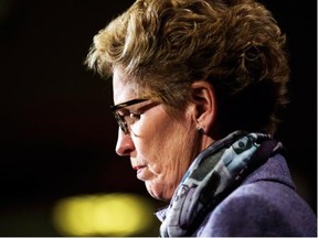 Ontario Premier Kathleen Wynne speaks at a press conference at Queen’s Park in December, 2013. THE CANADIAN PRESS/Mark Blinch