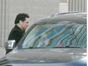 Patrick Brazeau leaves the Gatineau courthouse on Friday after he was released on $5,000 bail and ordered to check into a rehab facility within 72 hours.