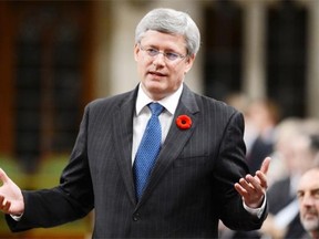 Prime Minister Stephen Harper responds to a question during question period in the House of Commons on Parliament Hill in Ottawa on Wednesday, November 6, 2013. THE CANADIAN PRESS/Sean Kilpatrick