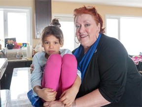 Renn, and her mother is Fran Forsberg pose for a photograph at their acreage just outside of Saskatoon, Tuesday, April 1, 2014. Renn Forsberg’s family says that, in her heart and in her brain, their six-year-old is a girl. They want her birth certificate to reflect that. Better yet, they argue, the sex box now marked with an ‘M’ should be removed from the document altogether.