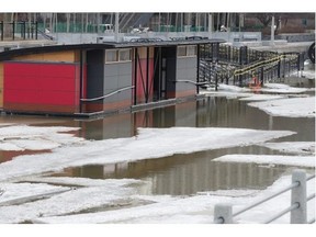 NCC skate shacks and vender outlets that have yet to be removed from the Rideau Canal are being flooded by melt water from rain and warmer spring time temperatures.