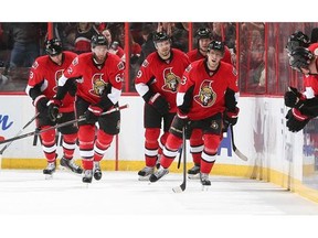 Ales Hemsky #83 of the Ottawa Senators celebrates his second period goal against the Tampa Bay Lightning with teammates Eric Gryba #62, Marc Methot #3, Milan Michalek #9 and Jason Spezza #19 at Canadian Tire Centre on March 20, 2014 in Ottawa, Ontario, Canada.