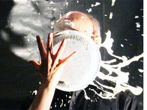 New Theatre of Ottawa artistic director John Koensgen gets a pie in the face during a benefit held for the theatre company at Cube Gallery on Sunday, April 6, 2014.