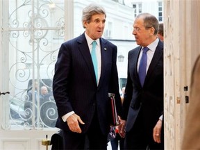 In this March 30, 2014, photo, U.S. Secretary of State John Kerry, left, is greeted by Russian Foreign Minister Sergey Lavrov at the Russian Ambassador’s Residence to discuss the situation in Ukraine, in Paris. AP Photo/Jacquelyn Martin, Pool