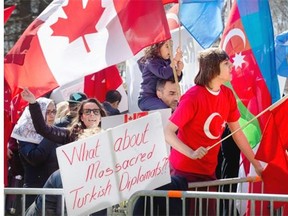 Turkish protesters face off against Armenian protesters outside the Turkish Embassy in Ottawa.