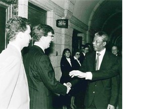 Jim Watson meeting Nelson Mandela in 1990.