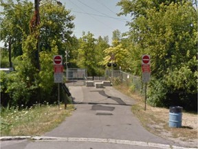 A Google Streetview image of the only level crossing on the O-Train line, along the Brookfield Multi-Use Pathway.