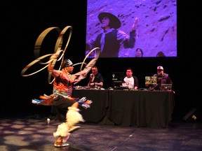 Aboriginal dancer James Jones on stage with A Tribe Called Red at a special concert hosted by Heritage Minister Shelly Glover at the National Arts Centre on Tuesday, May 27, 2014, to promote Canadian musicians.