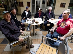 Good friends share a laugh and a coffee most mornings at Carlingwood Shopping Centre, including, from left, Harold St. George, Chris Finnerty, Paul Ferguson, Chuck Delfino, Gerry Dover, Harry Dunlap and Dave Cottee.