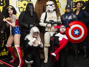 Cosplayers strike a pose as Ottawa Comiccon, which begins Friday at the EY Centre, held a press conference at Brother's Beer Bistro in the Byward Market. Photo taken on May 8, 2014. (Photo by Wayne Cuddington/ Ottawa Citizen)