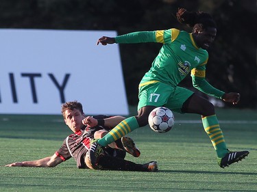 Ottawa Fury FC's Mason Trafford collides with Tampa Bay Rowdies  Lucky Mkosana during NASL action on Saturday, May 10, 2014 at Carleton University.