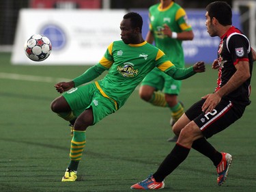 Ottawa Fury FC's Ramon Soria looks on as Tampa Bay Rowdies' Evans Frimpong prepares to make a play during NASL action on Saturday, May 10, 2014 at Carleton University.