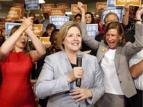 NDP leader Andrea Horwath received a raucous welcome from NDP supporters at Jennifer McKenzie's headquarters in downtown Ottawa Friday afternoon. McKenzie (centre right) is running in Ottawa Centre.