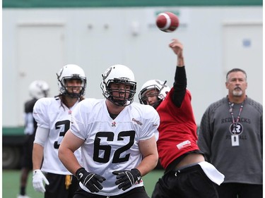 #62 Nolan MacMillan  and #9 Brandon Bialkowski practice during the opening day for the RedBlacks rookies training camp. May 28, 2014.