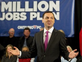 Ontario PC leader Tim Hudak speaks at a breakfast town hall meeting during a campaign stop in Barrie, Ont., on Friday, May 9, 2014.
