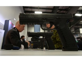 A handgun manufacturer product is displayed at the CANSEC trade show in Ottawa on Wednesday, May 28, 2014.