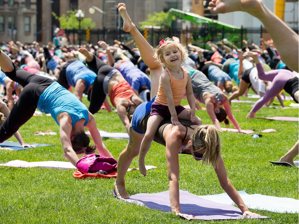 This week in photos: A baby, some sun and downward dogs