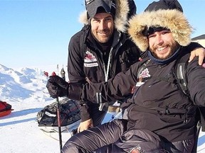 Sgt. Bjarne Nielsen, right, is one of 12 soldiers who took part in the 140-kilometre expedition to the Magnetic North Pole on Wednesday. He had his left leg, and part of his left arm, amputated after an IED blast in Afghanistan on Canada Day of 2010.