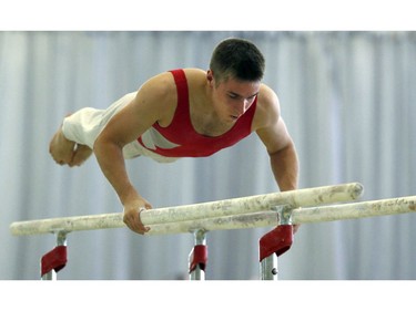 Bruno Webster (Ottawa) practices on the bars.