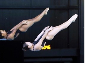 Canada’s Jennifer Abel, left, and Pamela Ware compete in the women’s open three-metre synchro at the Canada Cup Grand Prix diving competition in Gatineau, Que., on Sunday May 4, 2014.