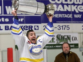 Carleton Place Canadians' captain Elias Ghantous lifts the Bogart Cup after his team beat Smiths Falls Bears last year. The Canadians are looking to repeat.