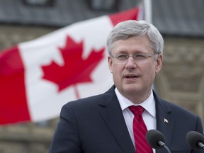 Canadian Prime Minister Stephen Harper speaks during a National Day of Honour Friday May 9, 2014 in Ottawa. The National Day of Honour commemorates the Canadian Forces THE CANADIAN PRESS/Adrian Wyld